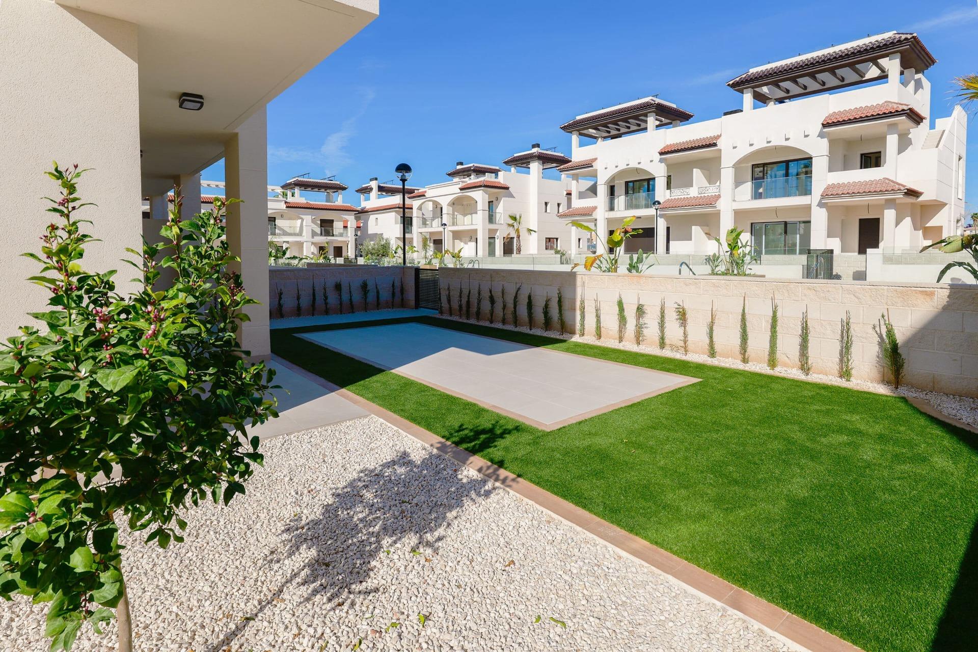 Sun-drenched modern new build 2 bedroom ground floor bungalow garden with private pool in Doña Pepa, Rojales.