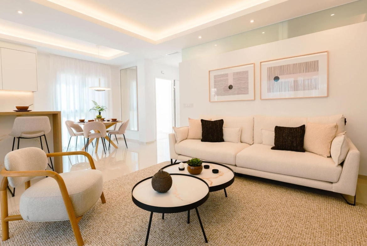 Bright and modern living room with elegant furnishings in a 2-bedroom ground floor bungalow in Doña Pepa, Rojales.