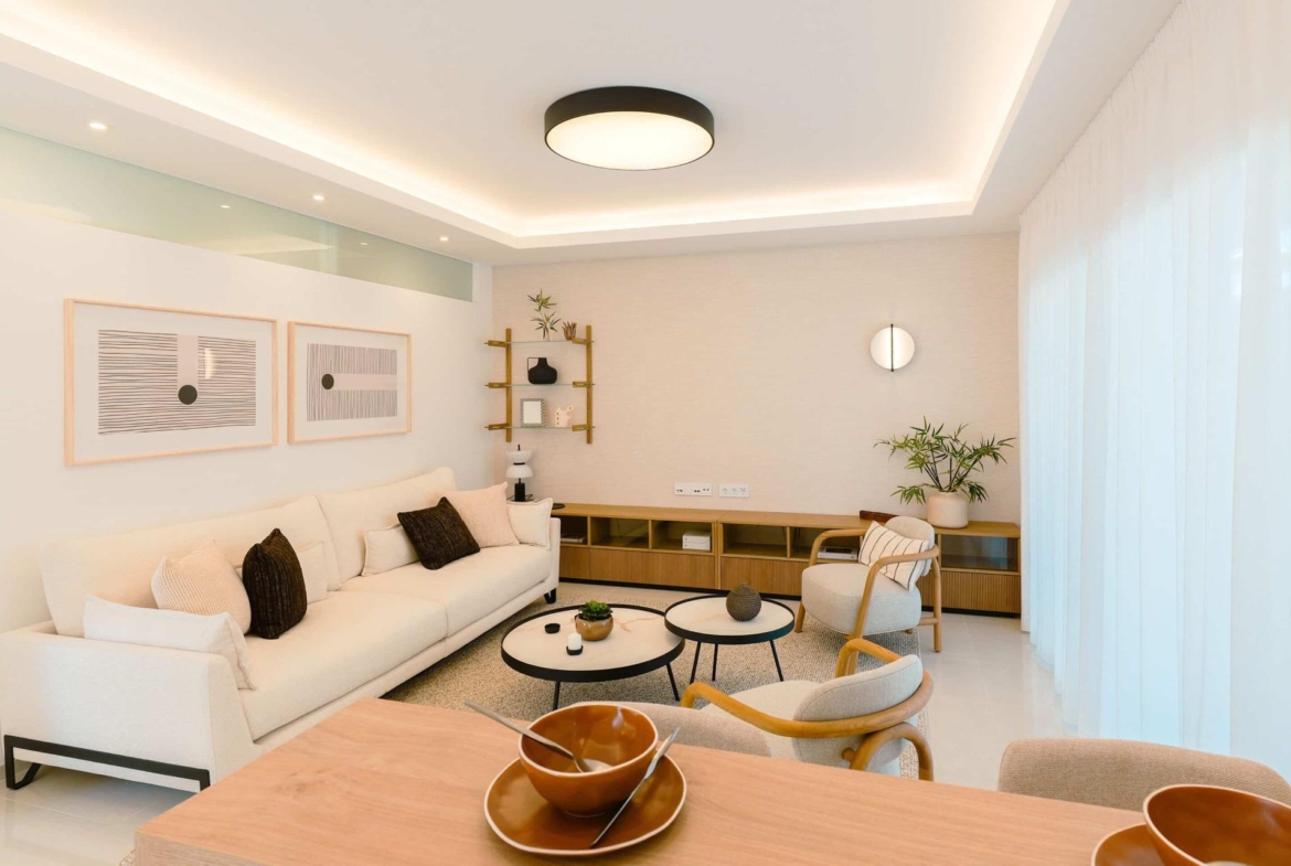 Bright and modern open-plan living room in a luxury 2-bedroom ground floor bungalow in Doña Pepa, Rojales.