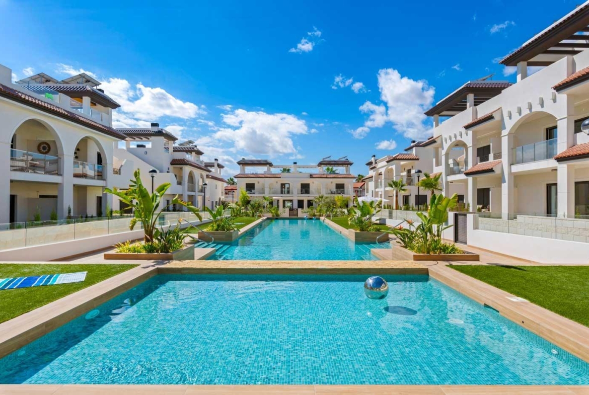 Stunning modern two-bedroom ground floor bungalow in Doña Pepa, Rojales, featuring a sun-drenched pool and landscaped gardens.