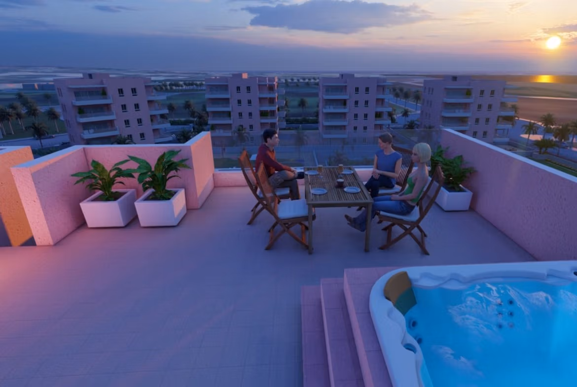 Sun-drenched solarium terrace with jacuzzi and panoramic views at luminous 3-bedroom penthouse in El Raso, Guardamar del Segura.