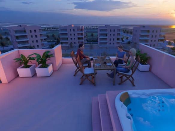Sun-drenched solarium terrace with jacuzzi and panoramic views at luminous 3-bedroom penthouse in El Raso, Guardamar del Segura.