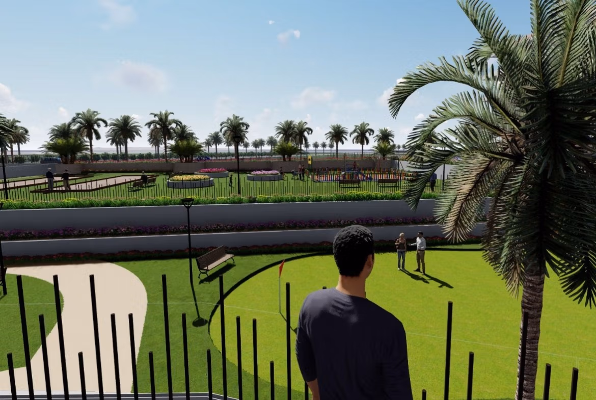 Lush landscaped garden with palm trees and green lawns at a luminous new build 3-bedroom penthouse in El Raso, Guardamar del Segura