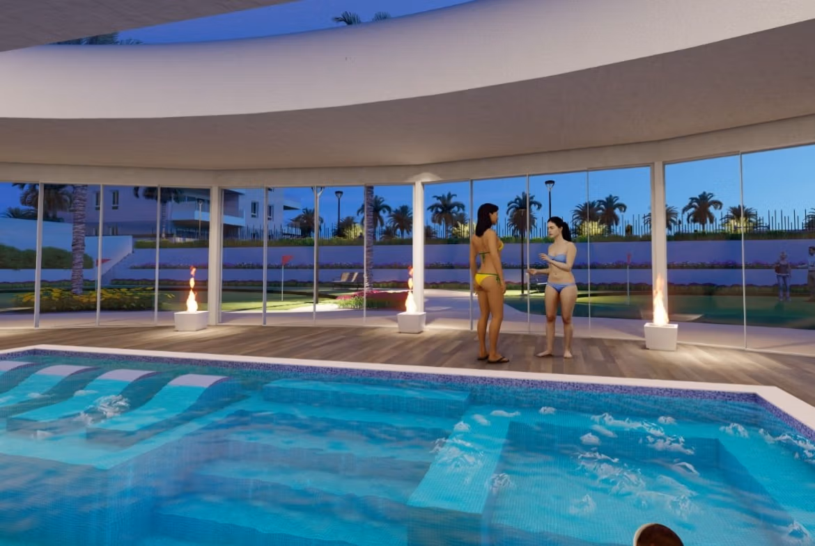 Sun-drenched private indoor pool with modern glass walls in luminous 3-bedroom penthouse with solarium in El Raso, Guardamar del Segura.