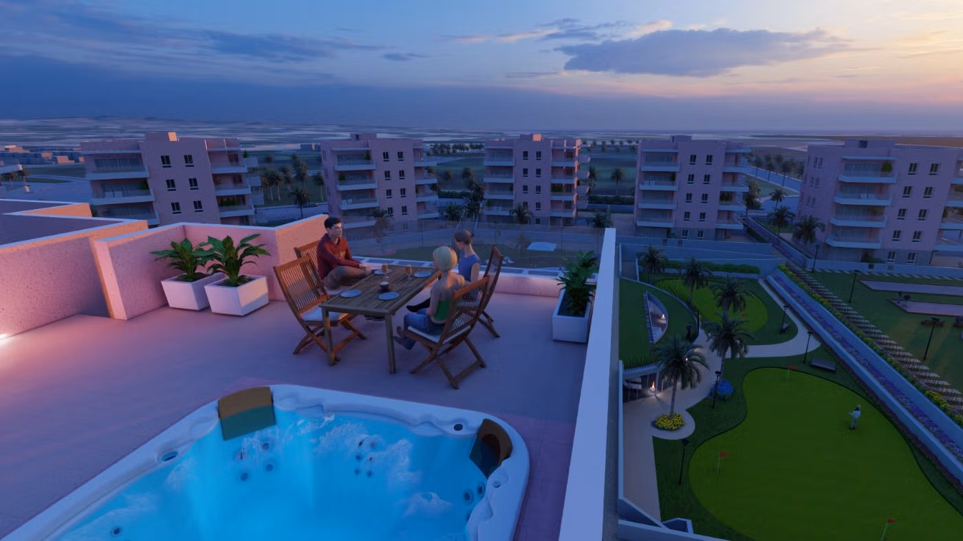 Spacious rooftop terrace with modern jacuzzi and sunset views overlooking landscaped gardens, part of a 3-bedroom ground floor apartment in El Raso.