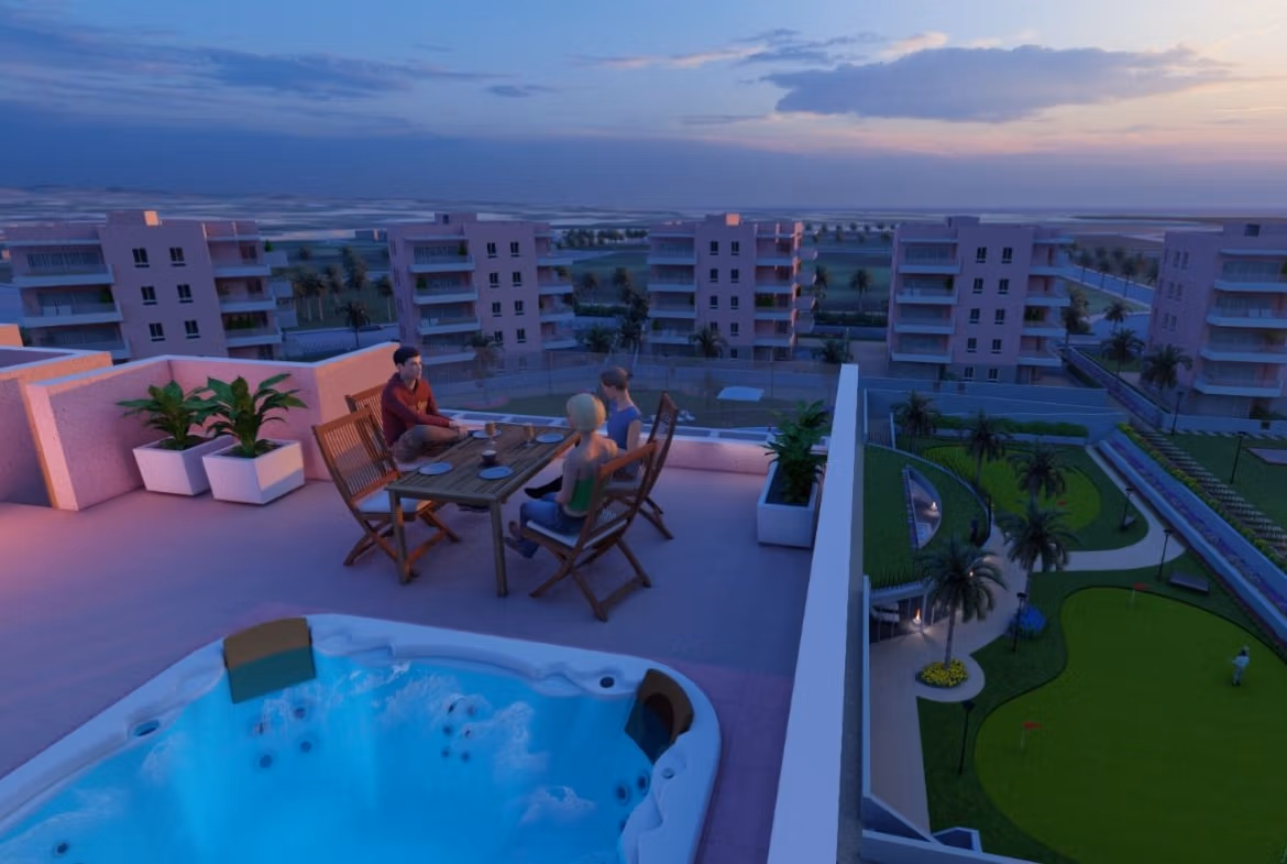 Spacious sun-drenched penthouse solarium with jacuzzi, modern outdoor seating, and panoramic views in El Raso, Guardamar del Segura.