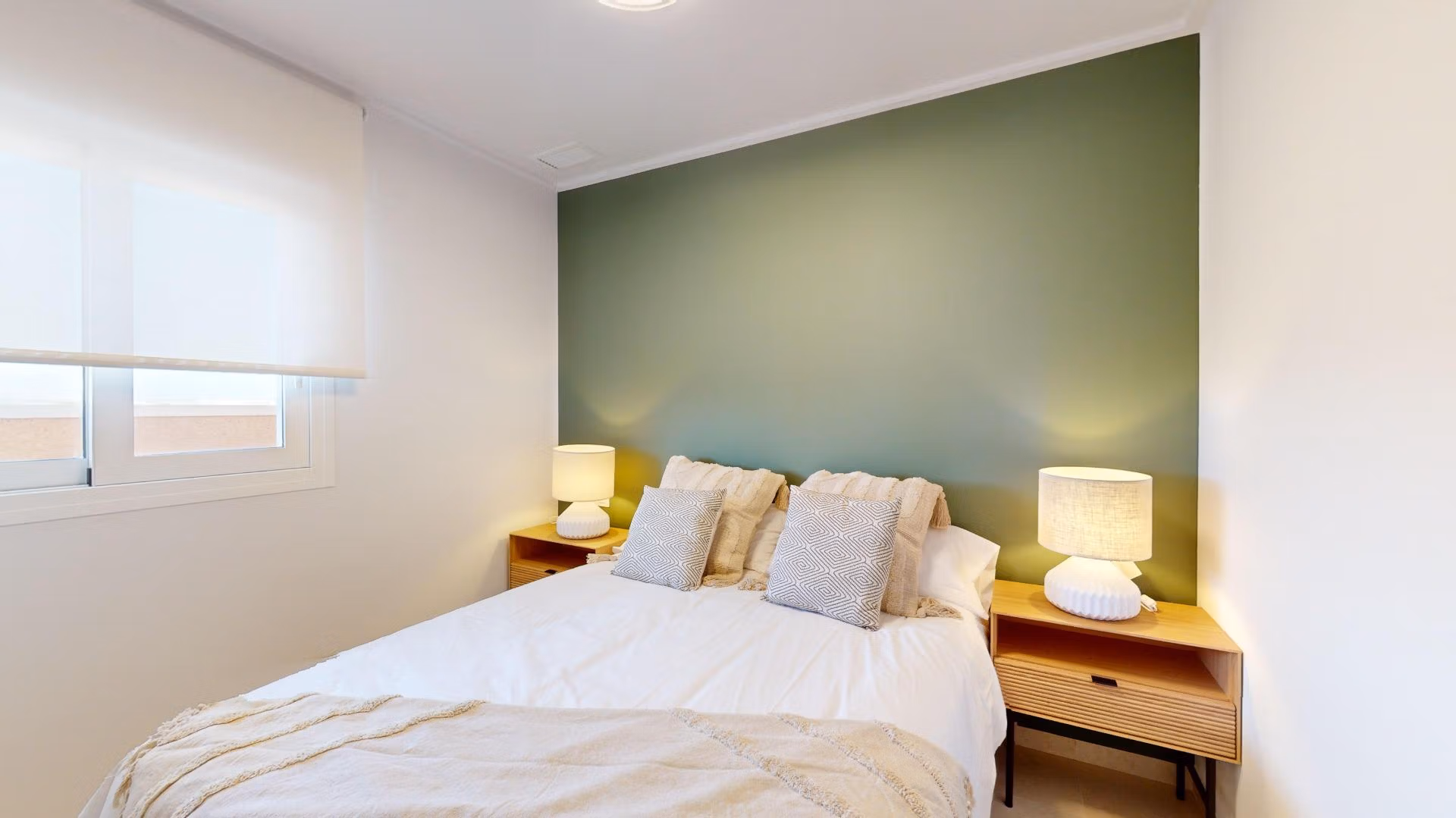 Bright and serene bedroom with modern decor in a luminous 3-bedroom penthouse with solarium in El Raso, Guardamar del Segura.