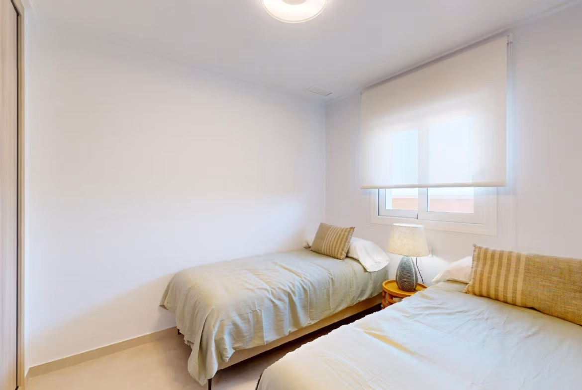 Bright, modern twin bedroom in luminous new build 3 bedroom penthouse with solarium in El Raso, Guardamar del Segura.