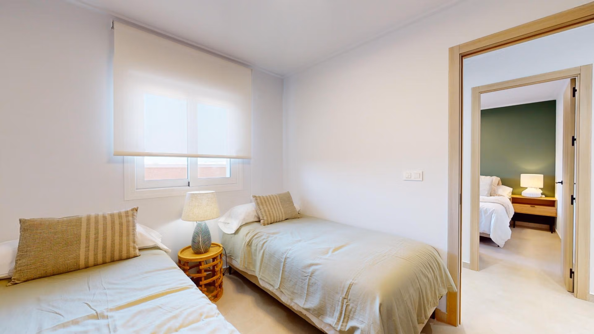 Bright and airy dual-bedroom with modern decor in luminous new build 3-bedroom penthouse with solarium in El Raso, Guardamar del Segura.