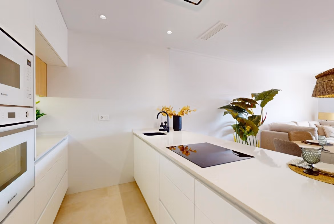 Bright modern open-plan kitchen and living area in luminous 3-bedroom penthouse with solarium in El Raso, Guardamar del Segura.