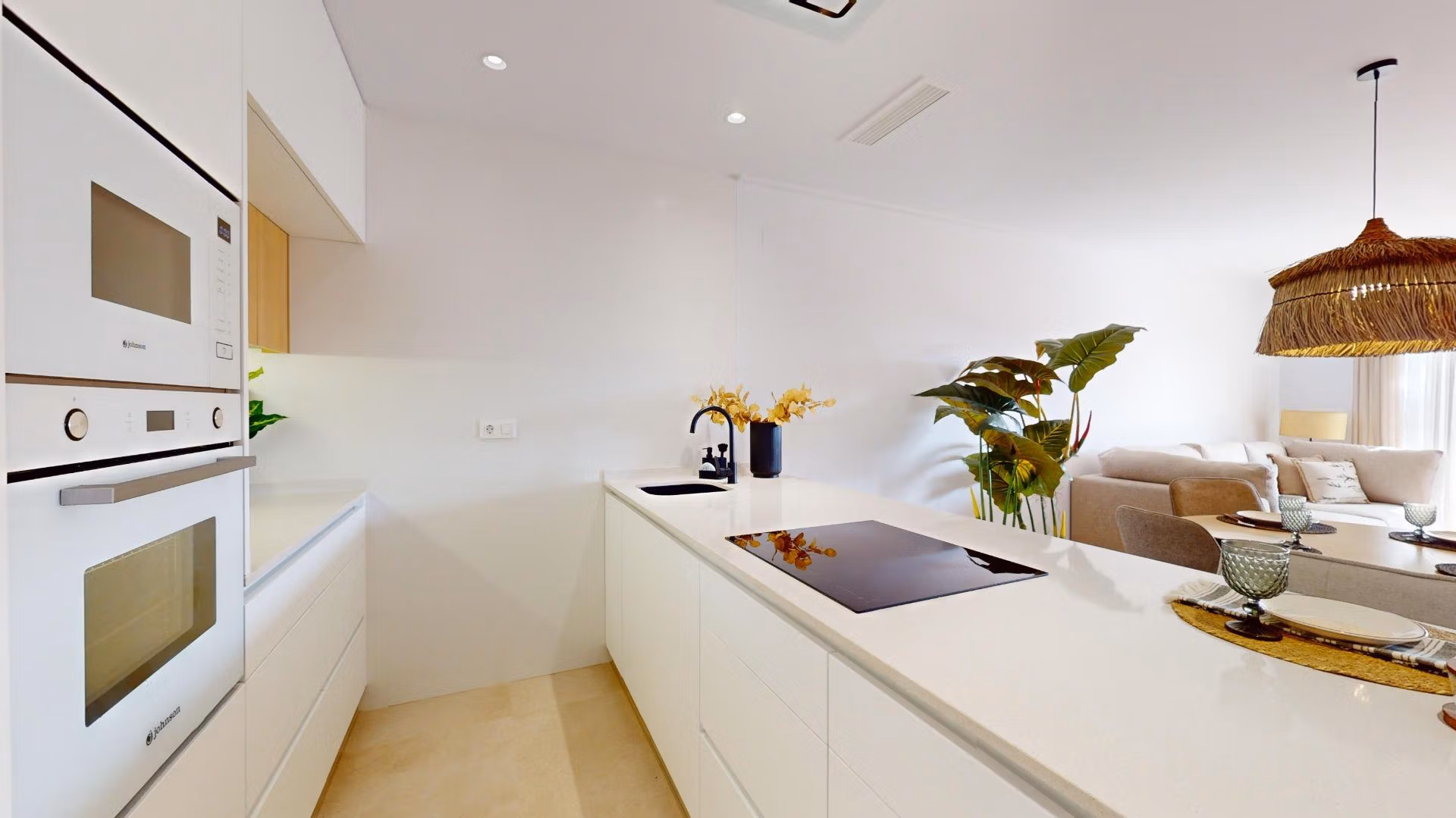 Bright modern open-plan kitchen and living area in luminous 3-bedroom penthouse with solarium in El Raso, Guardamar del Segura.