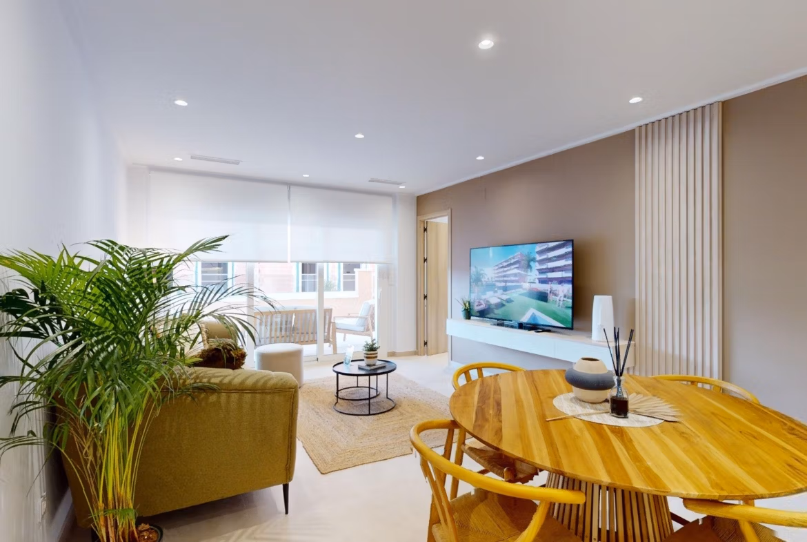 Bright and elegant open-plan living and dining area in a new build 3-bedroom ground floor apartment in El Raso, Guardamar del Segura.