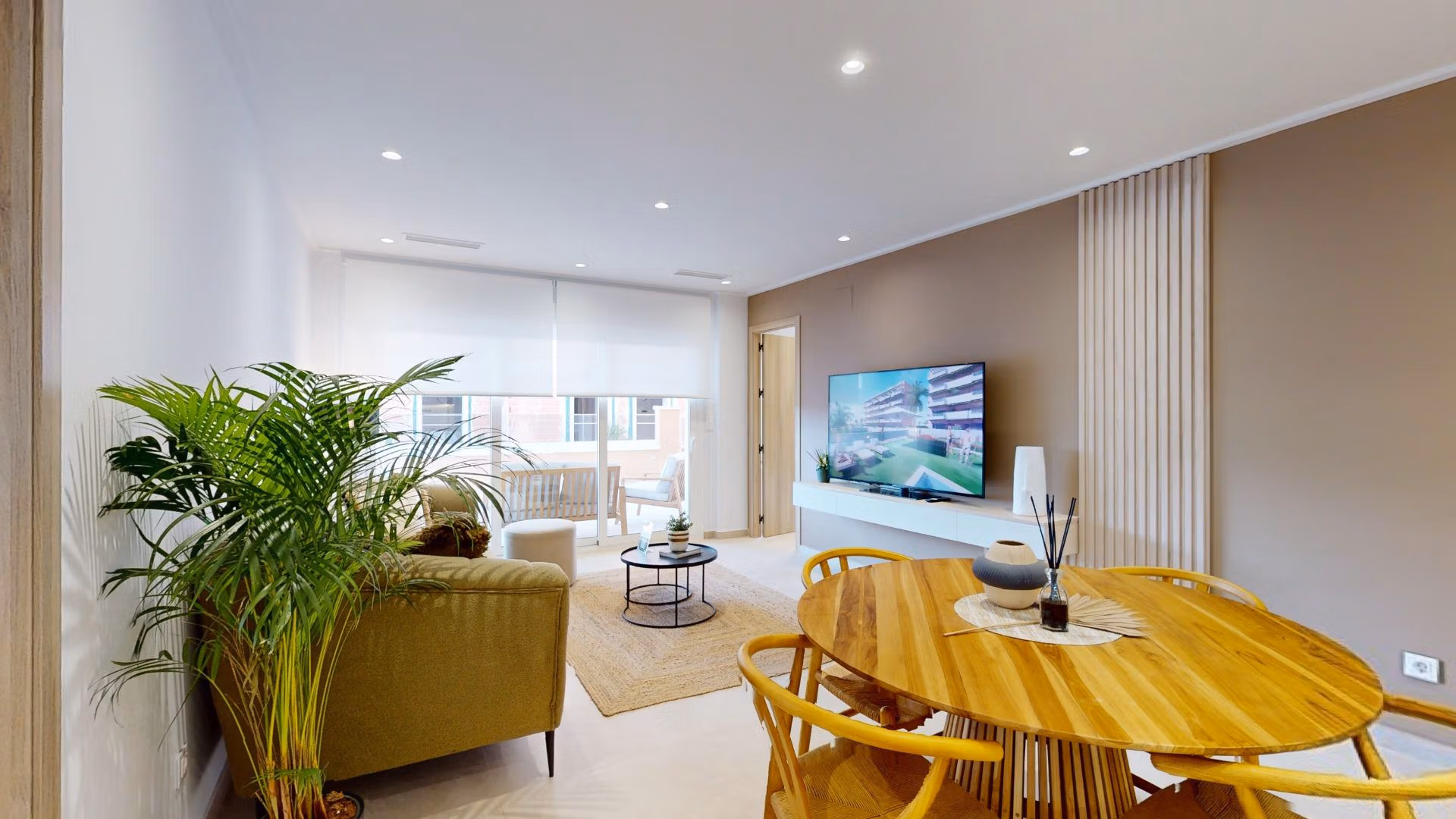 Bright and elegant open-plan living and dining area in a new build 3-bedroom ground floor apartment in El Raso, Guardamar del Segura.
