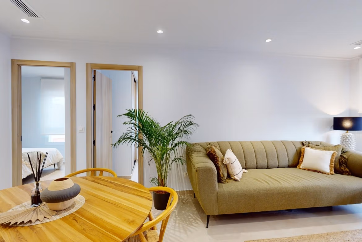 Bright and modern living room with natural light in a new build 3-bedroom ground floor apartment in El Raso, Guardamar del Segura