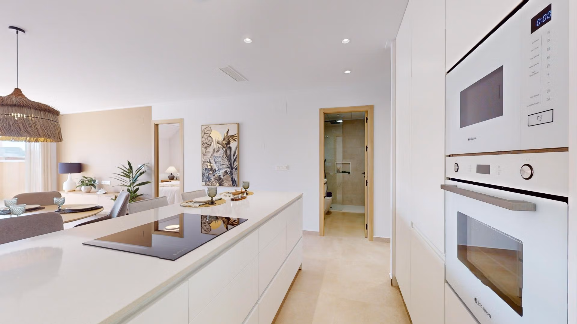 Bright modern kitchen with sleek built-in appliances and open-plan living in luxury 3-bedroom penthouse, El Raso, Guardamar del Segura.