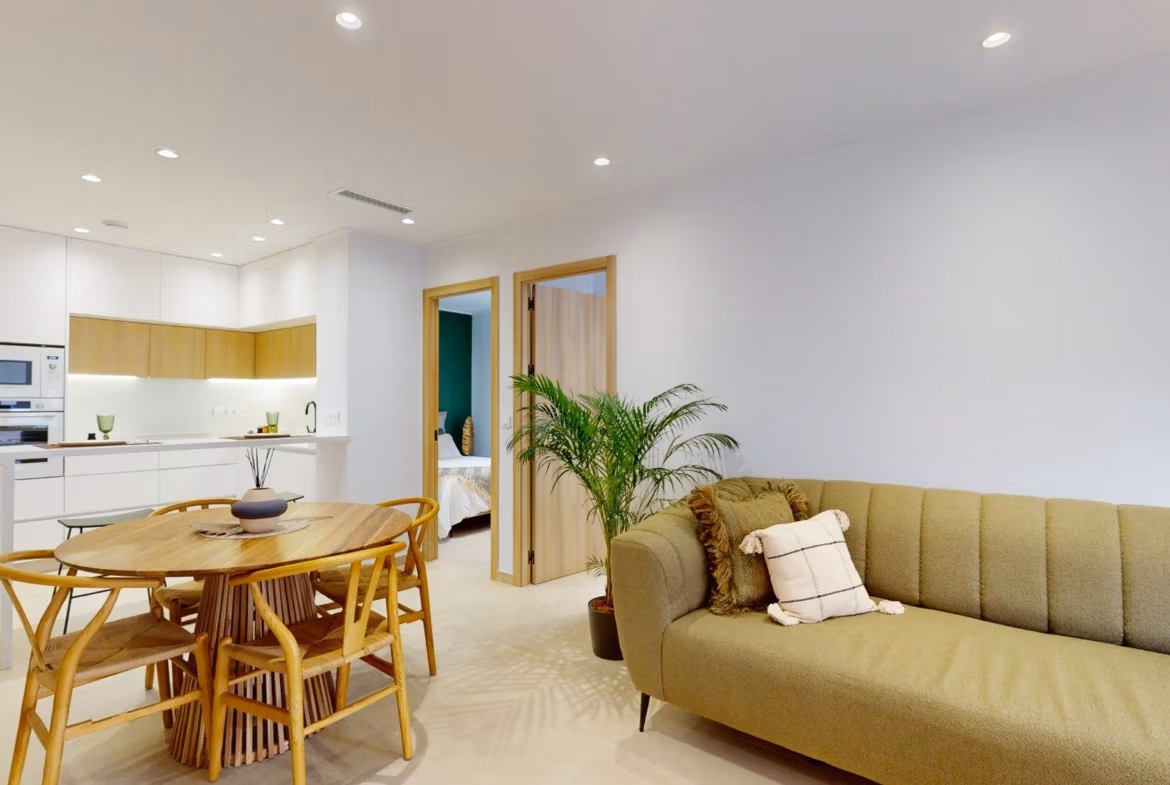 Bright open-plan living and dining area with modern kitchen in elegant 3-bedroom ground floor apartment, El Raso, Guardamar del Segura