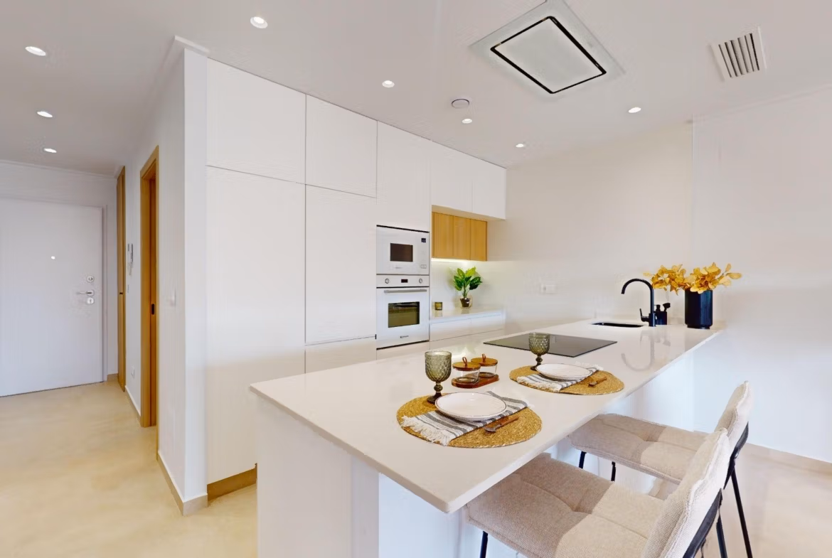 Bright, modern open-plan kitchen in a luminous 3-bedroom penthouse with solarium in El Raso, Guardamar del Segura