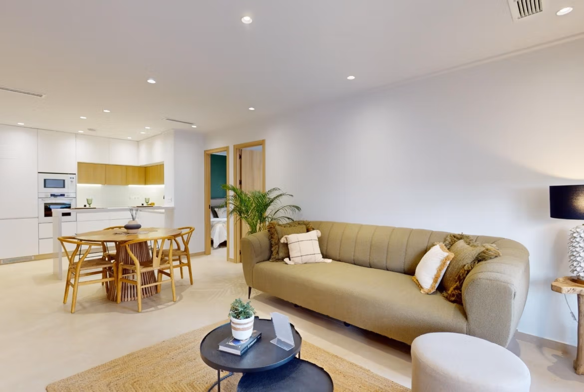 Bright, modern open-plan living area in a new 3-bedroom ground floor apartment with private garden in El Raso, Guardamar del Segura.