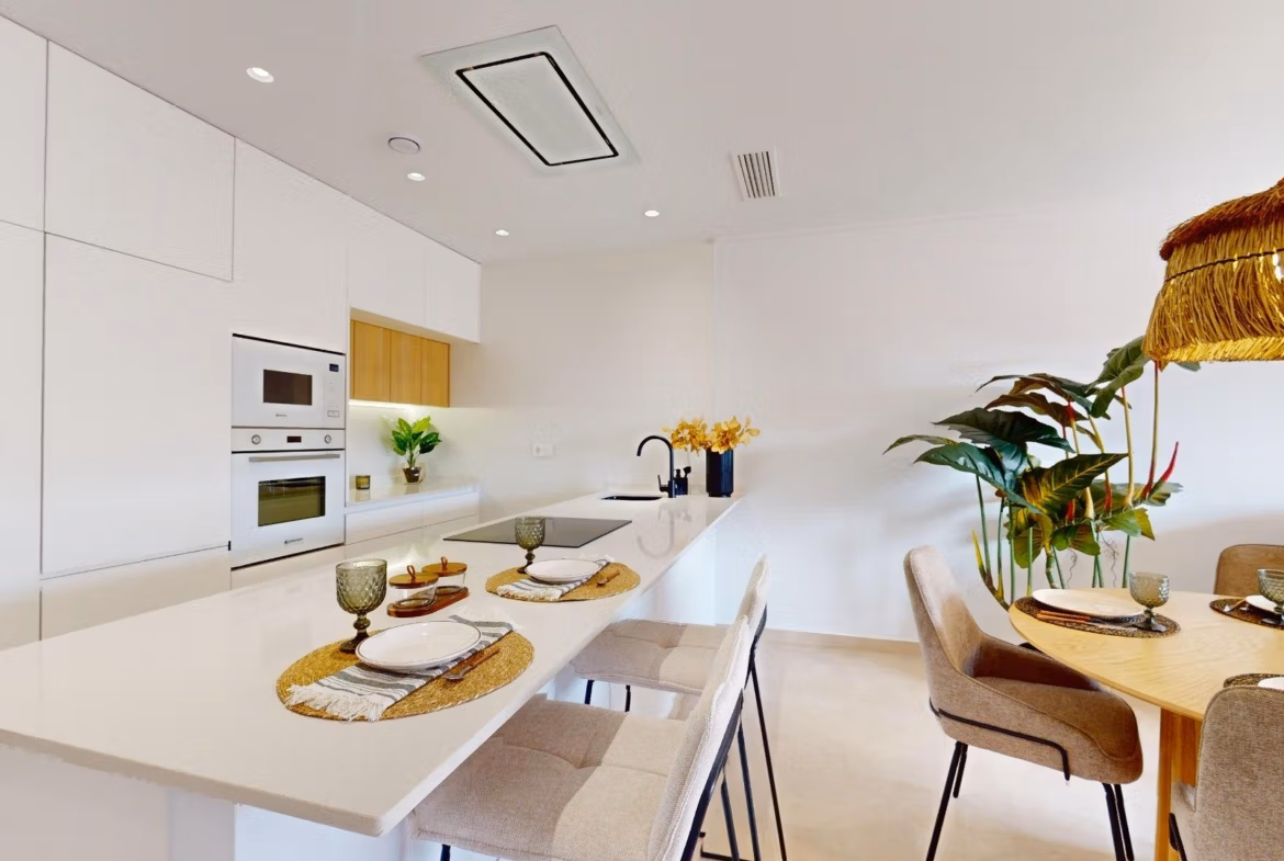 Bright modern open-plan kitchen and dining area in luminous 3-bedroom penthouse with solarium in El Raso, Guardamar del Segura