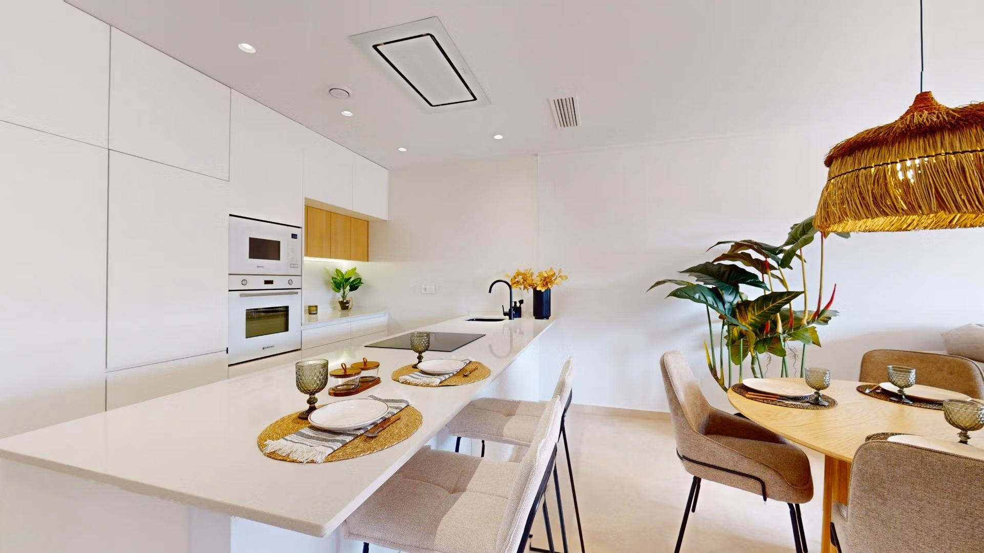 Bright modern open-plan kitchen and dining area in luminous 3-bedroom penthouse with solarium in El Raso, Guardamar del Segura