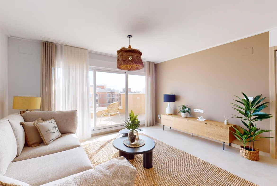 Bright and modern living room with cozy seating and balcony in luminous 3-bedroom penthouse, El Raso, Guardamar del Segura.