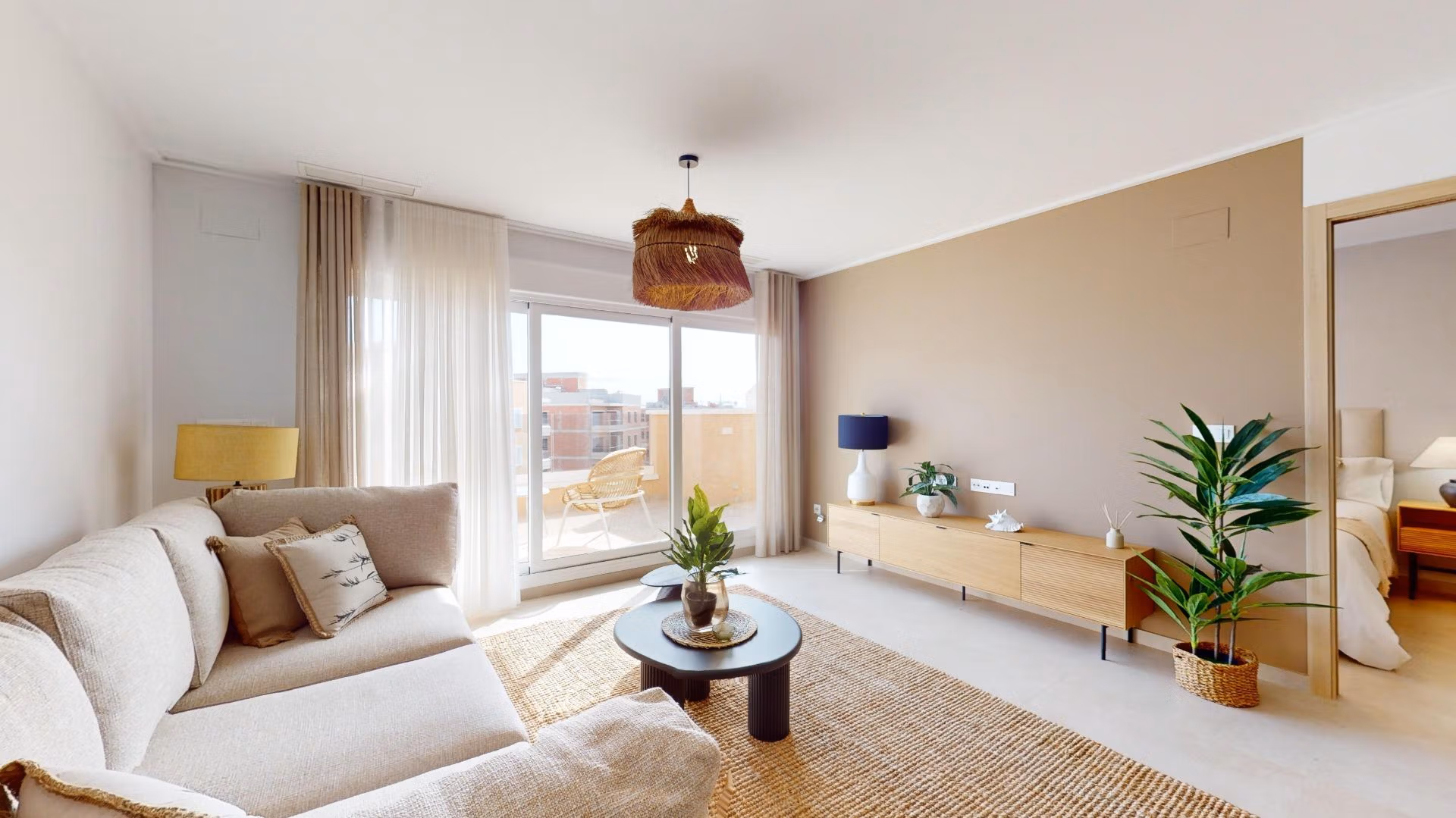Bright and modern living room with cozy seating and balcony in luminous 3-bedroom penthouse, El Raso, Guardamar del Segura.