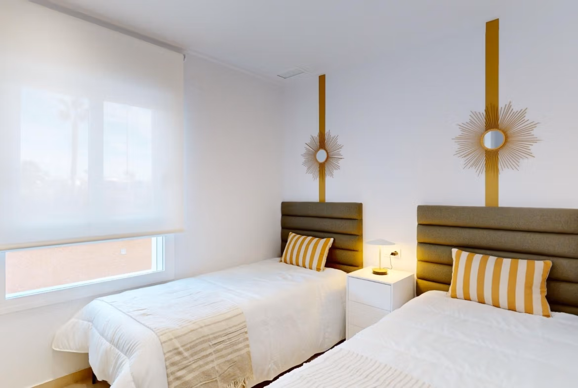 Bright and modern twin bedroom with minimalist decor in a new build 3-bedroom ground floor apartment in El Raso, Guardamar del Segura.