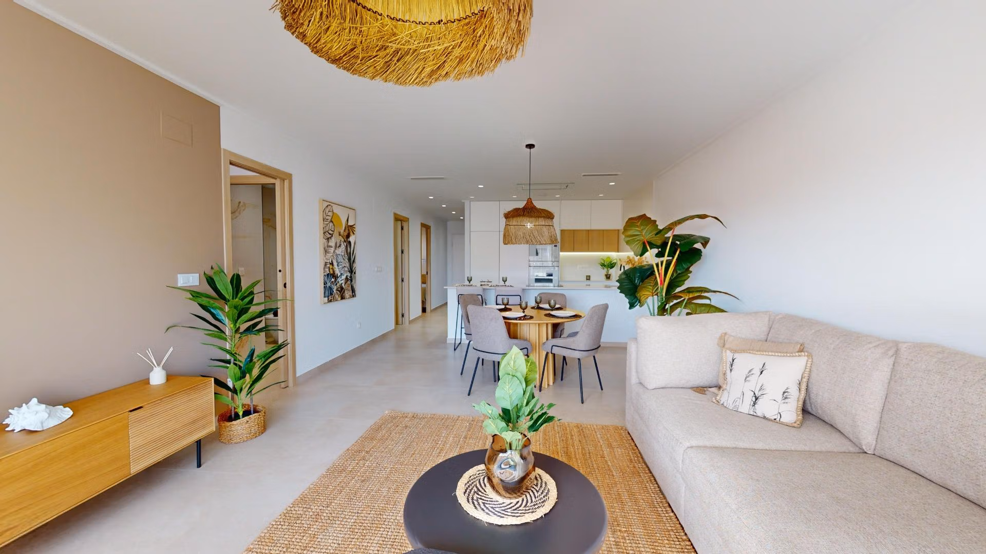 Bright open-plan living area with elegant dining and modern kitchen in a luminous 3-bedroom penthouse in El Raso, Guardamar del Segura