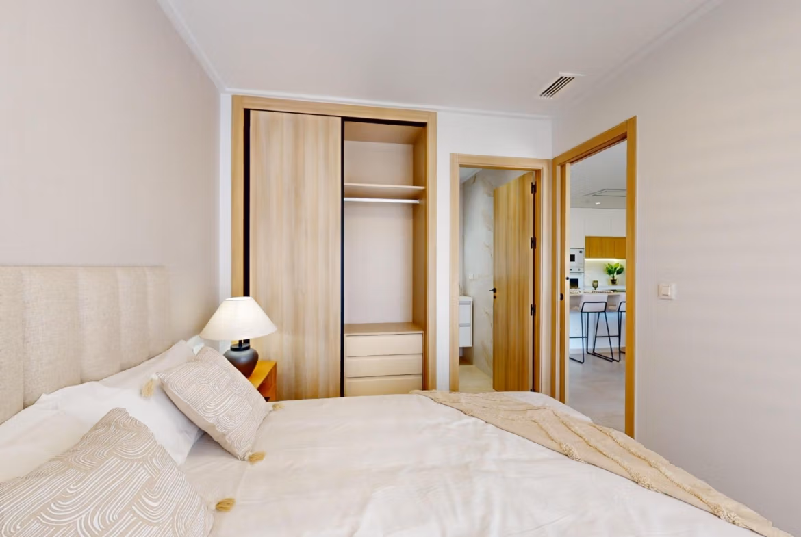 Bright, elegant bedroom with modern closets in a luminous new build 3-bedroom penthouse in El Raso, Guardamar del Segura.