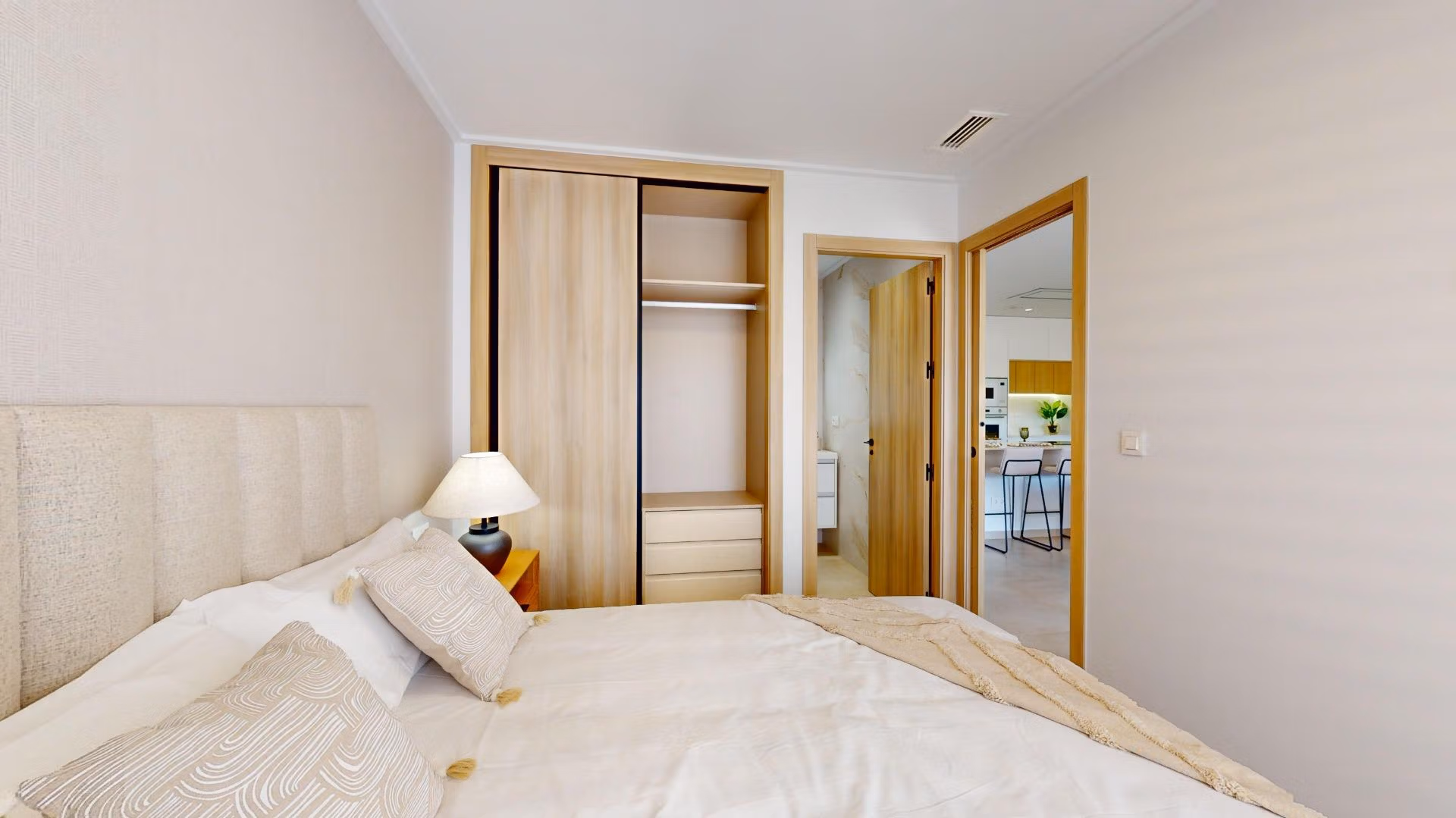 Bright, elegant bedroom with modern closets in a luminous new build 3-bedroom penthouse in El Raso, Guardamar del Segura.