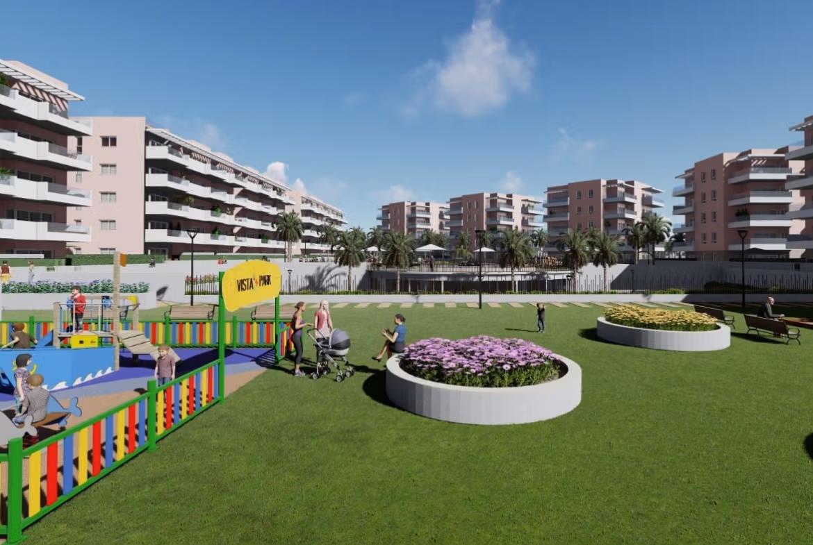 Spacious landscaped communal green area with modern playground in a luminous new build penthouse complex in El Raso, Guardamar del Segura