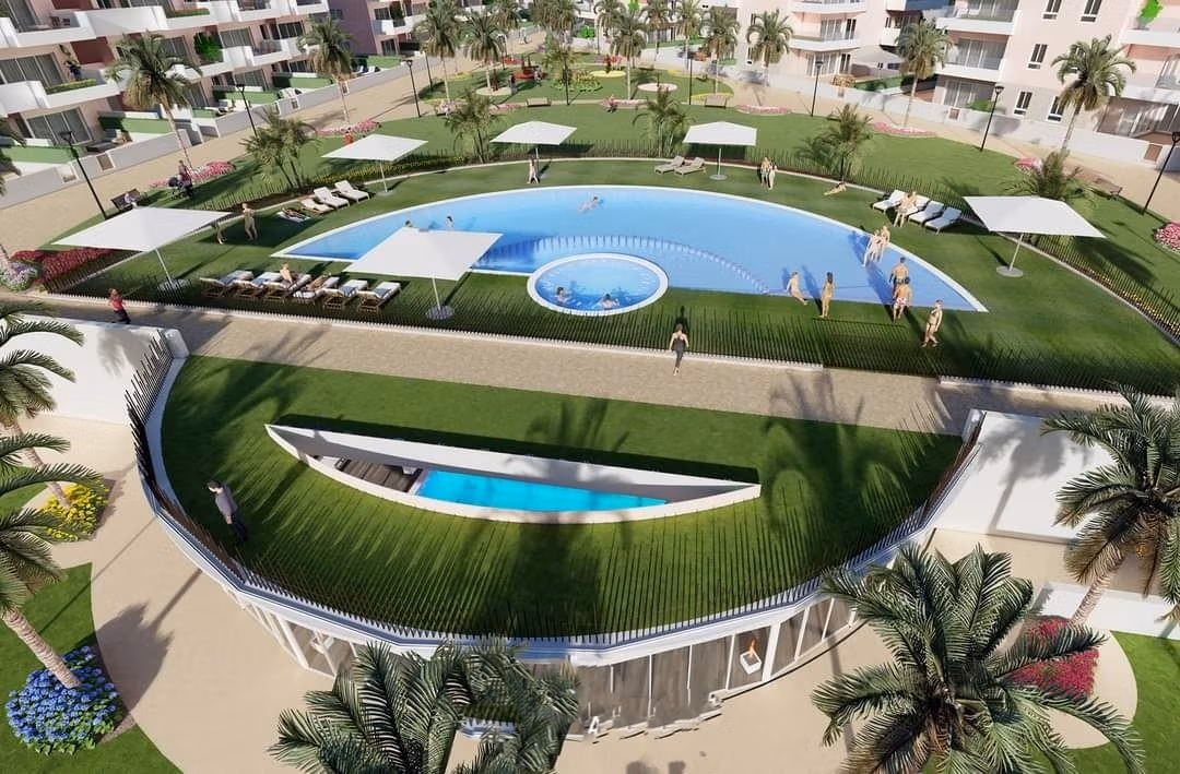 Sun-drenched modern pool and lush landscaped gardens at luminous 3-bedroom penthouse with solarium in El Raso, Guardamar del Segura