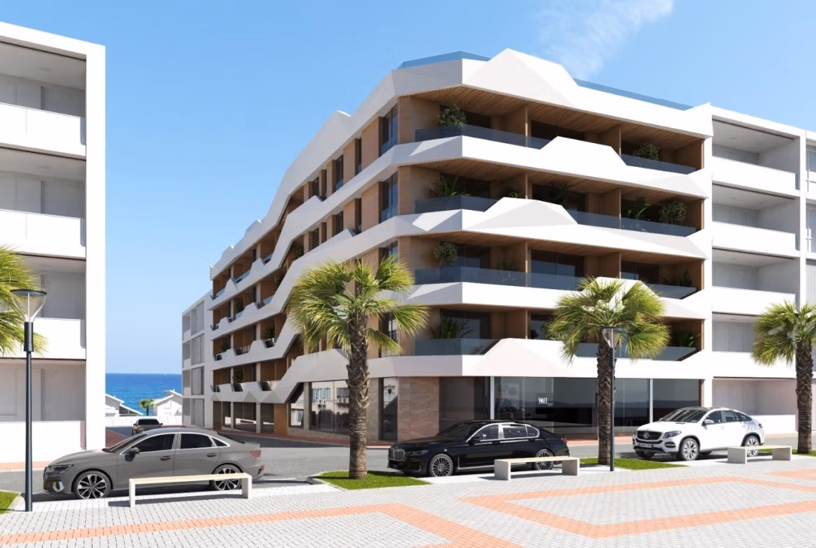 NEW-BUILD-RESIDENTIAL-IN-GUARDAMAR-DEL-SEGURA-16 Modern white new build 2-bedroom apartment in Guardamar del Segura with spacious balconies and ocean glimpses, just 100m from the beach.