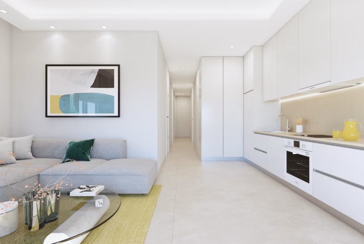NEW-BUILD-RESIDENTIAL-IN-GUARDAMAR-DEL-SEGURA-5 Bright modern open-plan living area with sleek kitchen in a luxury 2-bedroom apartment in Guardamar del Segura.