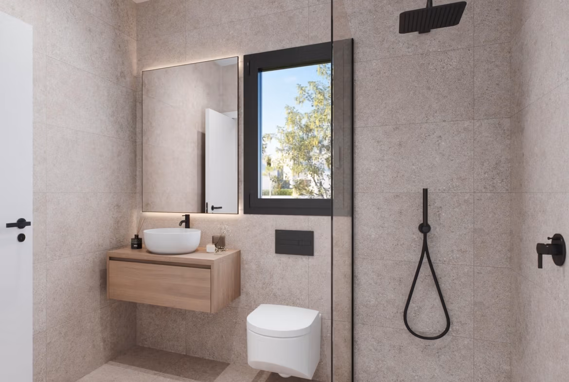 Modern, elegant bathroom with matte black fixtures and natural light in 3 Bedroom Penthouse at Santa Rosalía Lake and Life Resort