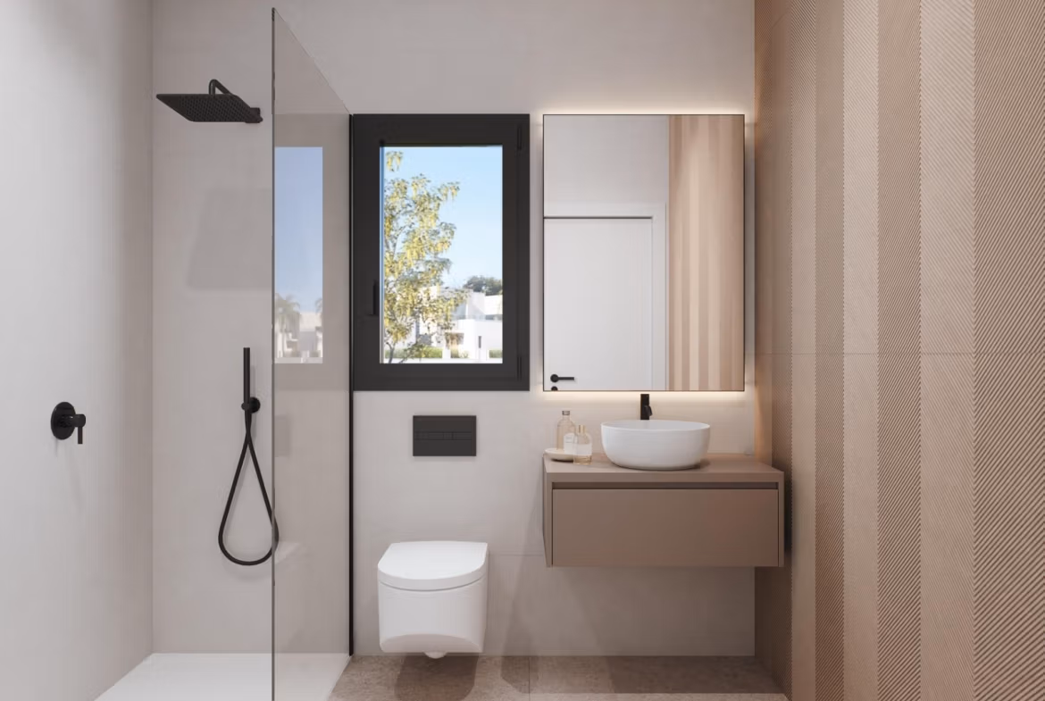 Bright modern bathroom with sleek fixtures and natural light in a luxury 3-bedroom penthouse at Santa Rosalía Lake and Life Resort.