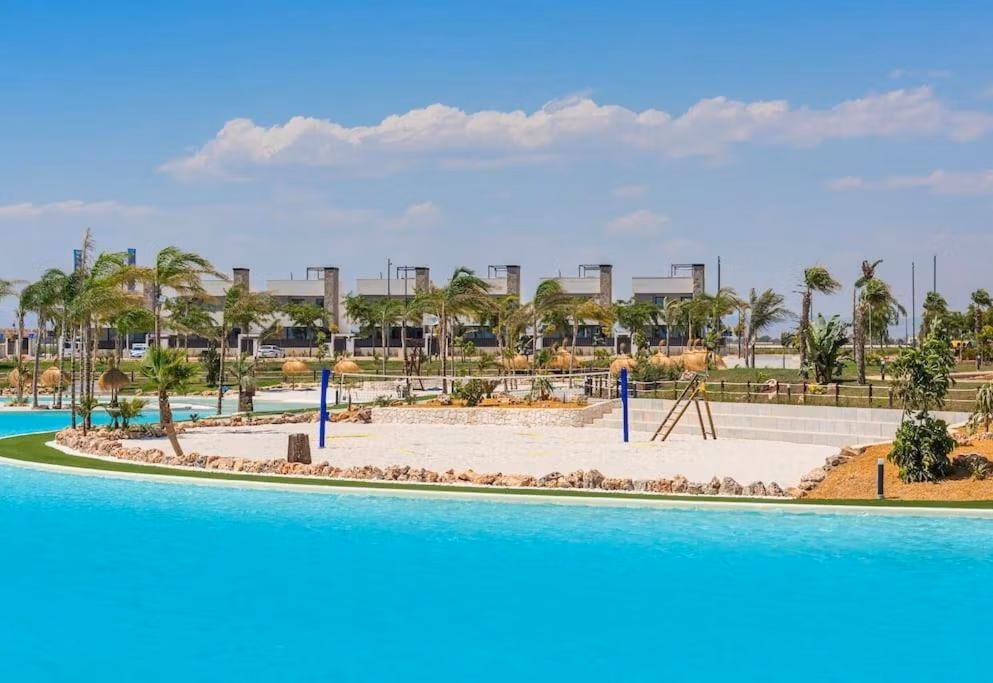 Private sun-drenched penthouse at Santa Rosalía Lake and Life Resort with stunning turquoise lagoon and lush landscaped surroundings