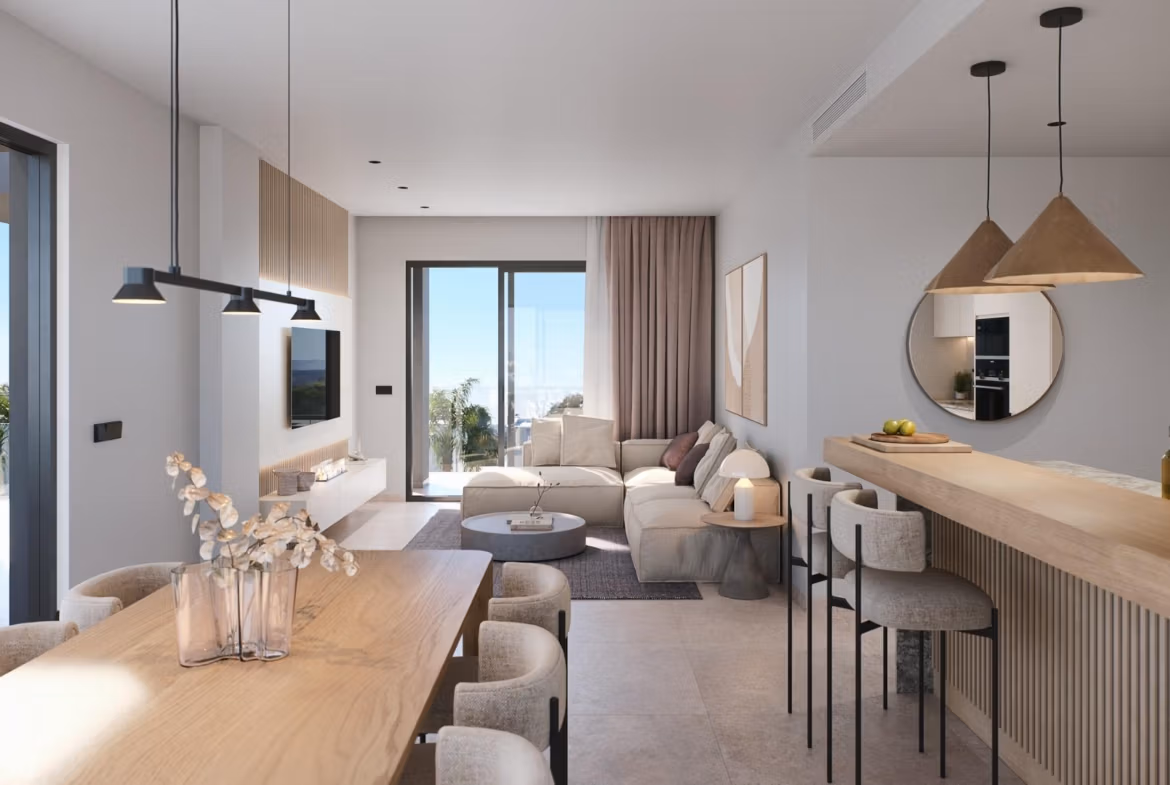 Bright open-plan living and dining area with modern furnishings in a 3-bedroom penthouse at Santa Rosalía Lake and Life Resort