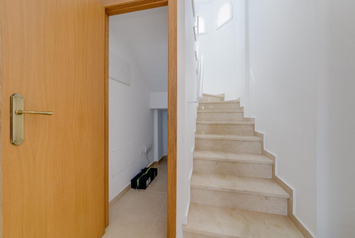 Bright, modern staircase and hallway in key ready 3 bedroom villa with garden and solarium in El Oasis, San Fulgencio.