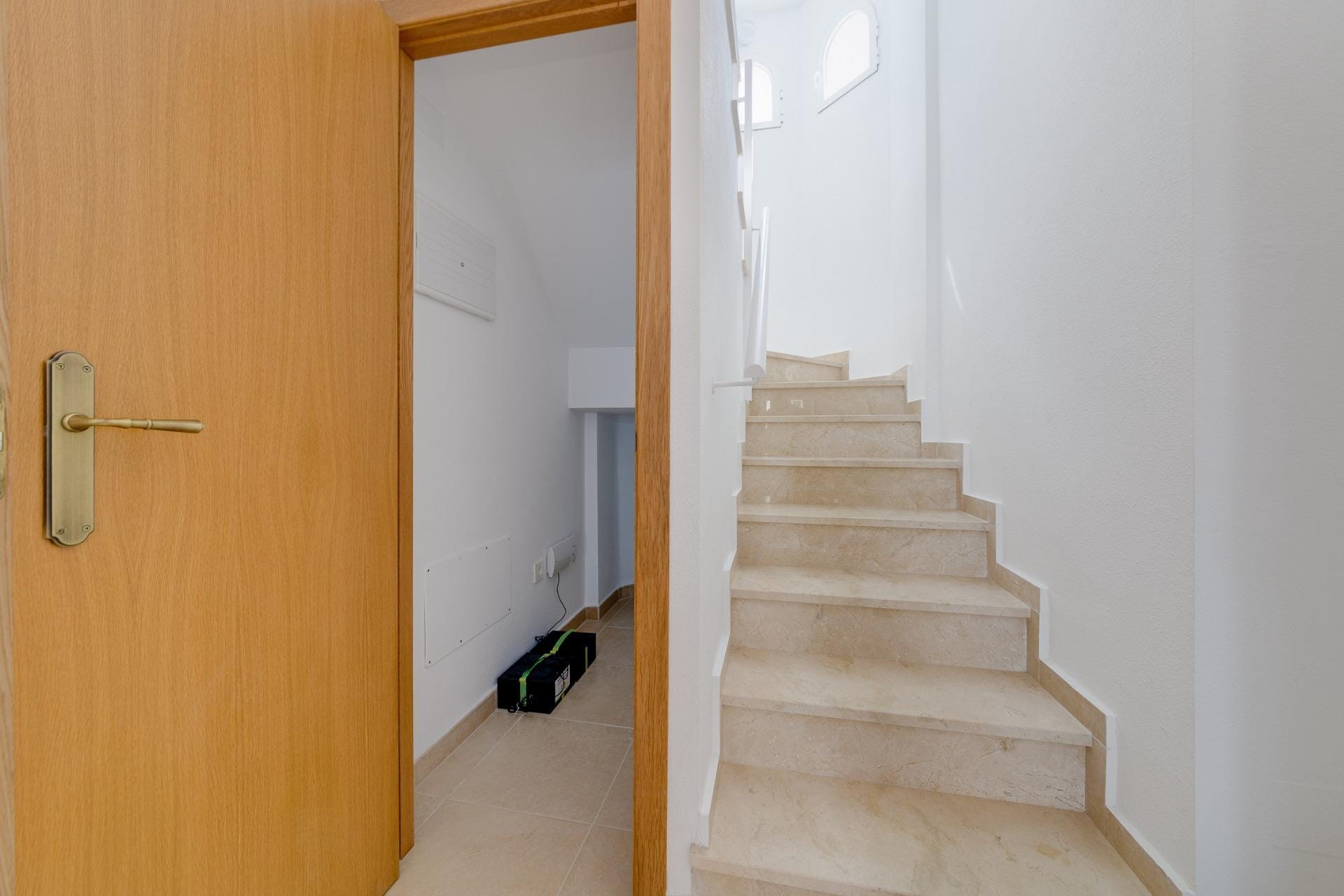 NEW-BUILD-RESIDENTIAL-IN-SAN-FULGENCIO-12 Bright, modern staircase and hallway in key ready 3 bedroom villa with garden and solarium in El Oasis, San Fulgencio.
