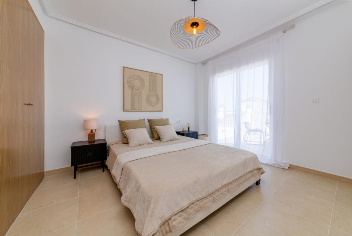 Bright and elegant bedroom in a key ready 3-bedroom villa with garden and solarium in El Oasis, San Fulgencio.