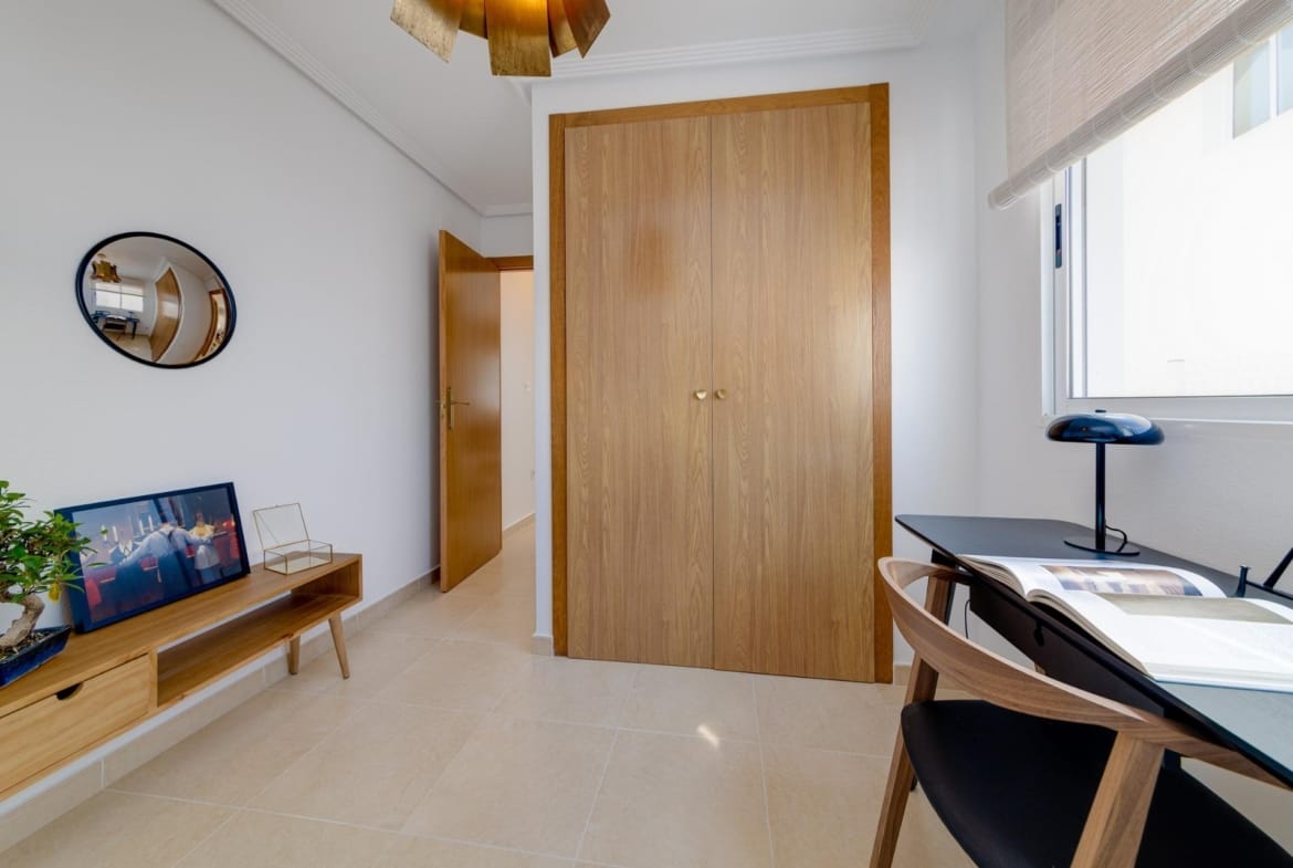 Bright and modern home office with built-in wooden wardrobe in key ready 3 bedroom villa in El Oasis, San Fulgencio