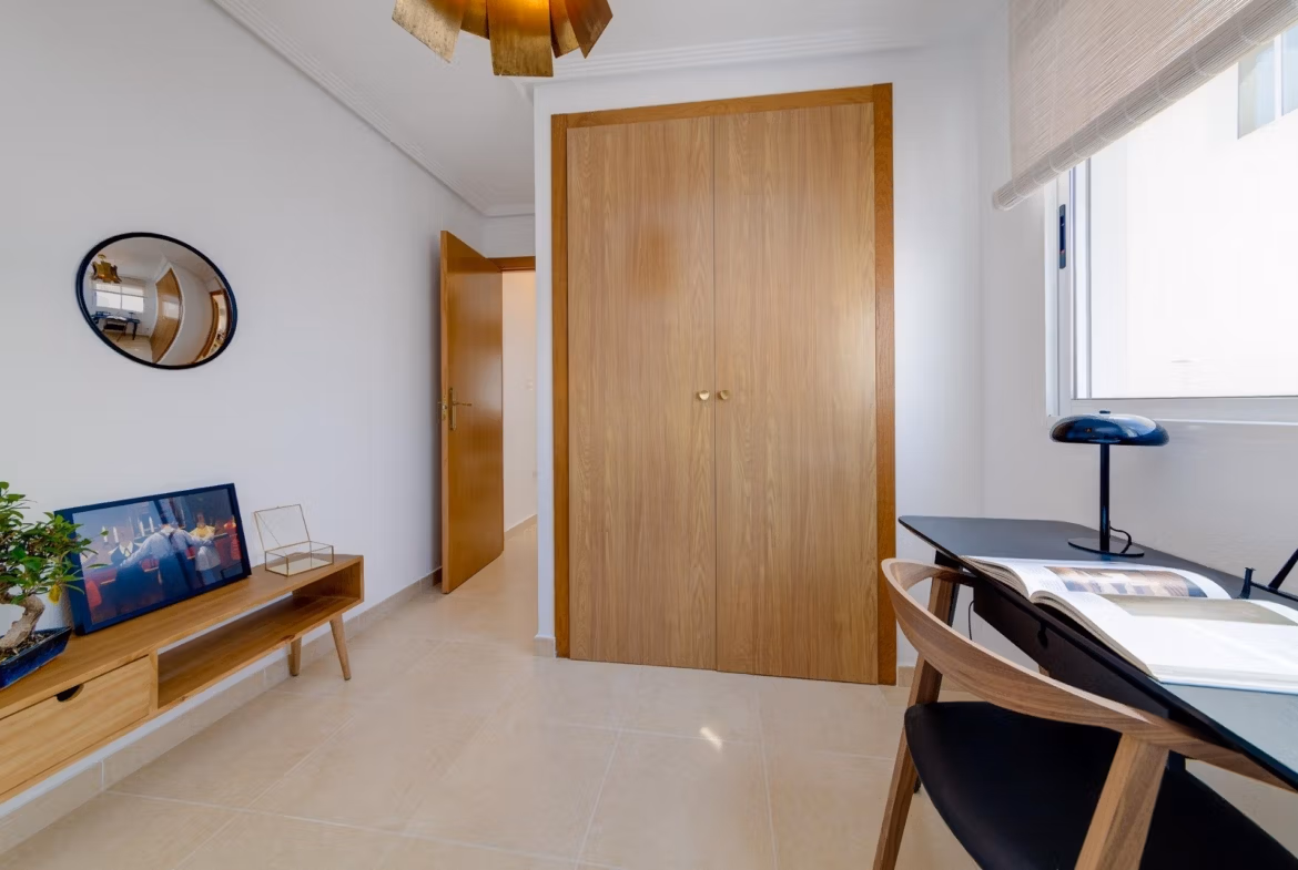 NEW-BUILD-RESIDENTIAL-IN-SAN-FULGENCIO-24 Bright and modern 2 bedroom semi-detached villa bedroom in El Oasis La Marina with minimalist decor and natural light