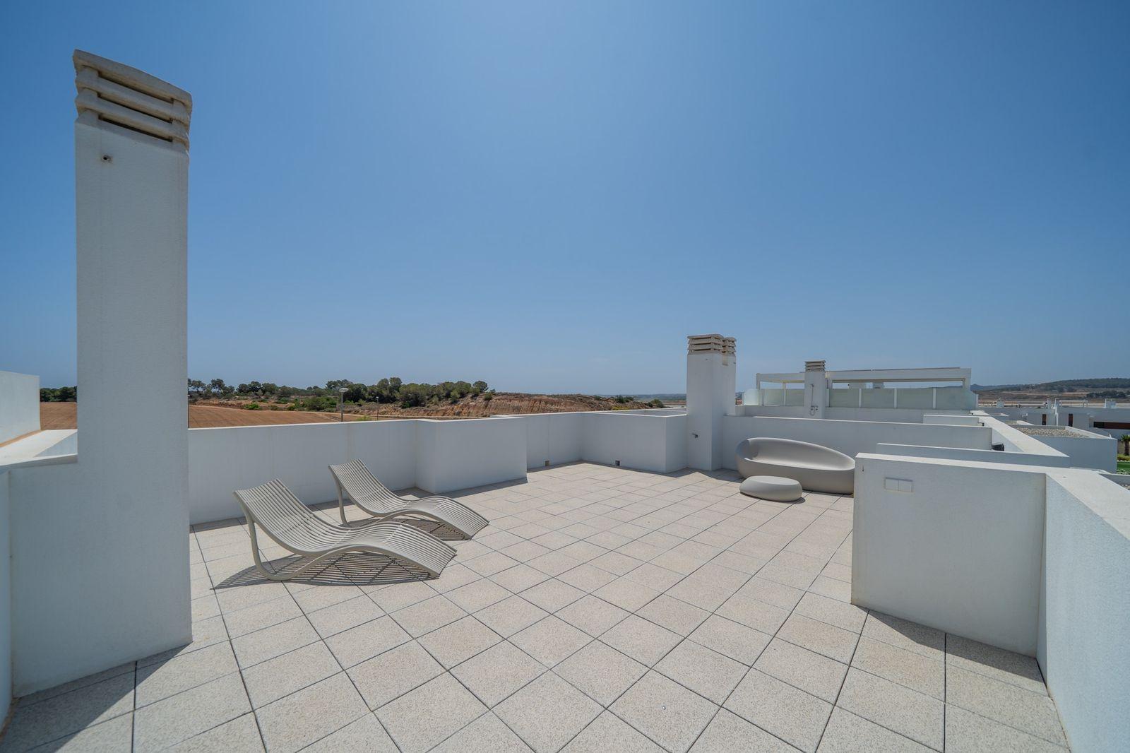 NEW-BUILD-RESIDENTIAL-OF-BUNGALOW-APARTMENTS-IN-VISTABELLA-3 Spacious sun-drenched solarium with sleek loungers atop modern 2-bedroom bungalow in Vistabella Golf, Orihuela