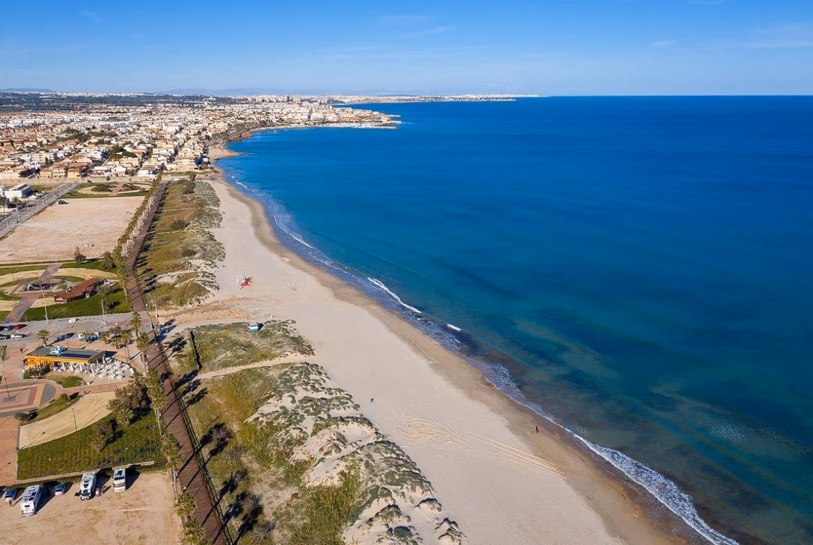 Panoramic sun-drenched coastline with pristine beach near luxury new build 3-bedroom corner semi-detached villa in Pilar de la Horadada