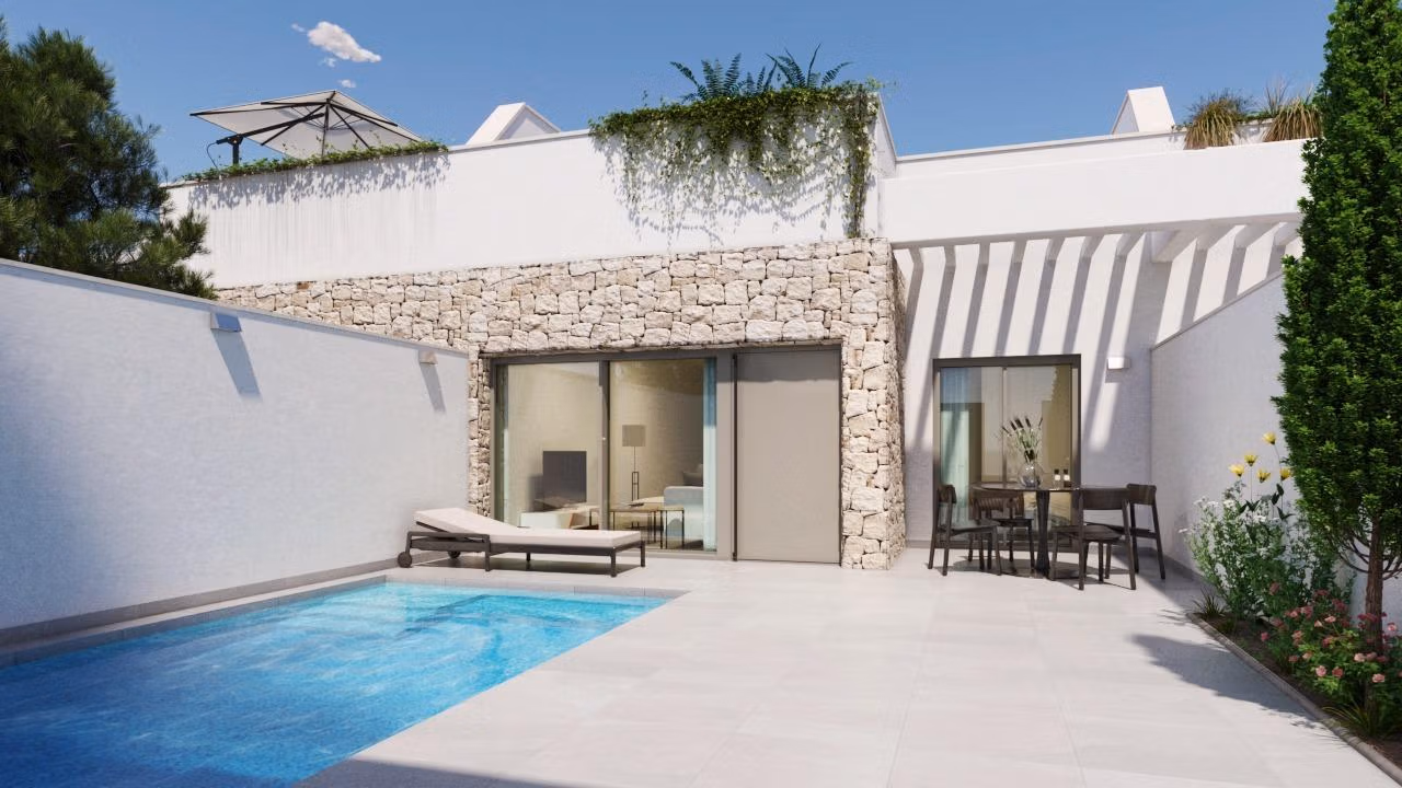 EINGESCHOSSIGE NEUBAU-DOPPELHAUSHÄLFTEN IN PILAR DE LA HORADADA Moderne Eckdoppelhaushälfte in Pilar de la Horadada mit Privatpool, sonniger Terrasse, Fassade mit Steinakzenten und üppigem Grün.