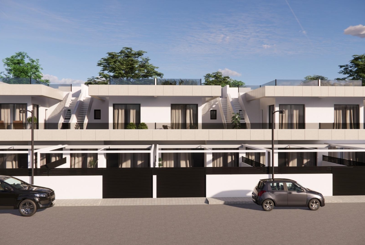 Sleek, modern 3-bedroom townhouse in Rojales with sun-drenched terraces, private pool, and spacious basement parking.