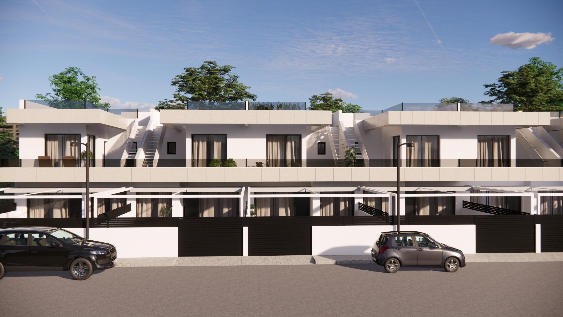Sleek, modern 3-bedroom townhouse in Rojales with sun-drenched terraces, private pool, and spacious basement parking.