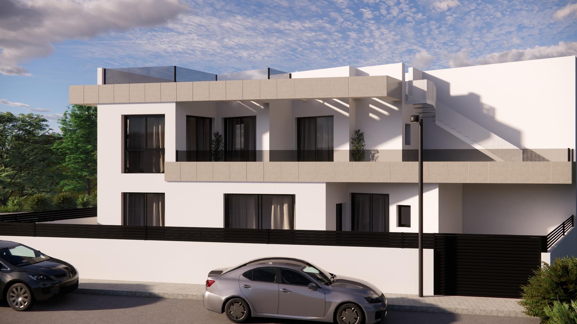 Modern new build 3-bedroom townhouse in Rojales with sleek white exterior, spacious balconies, and private parking.