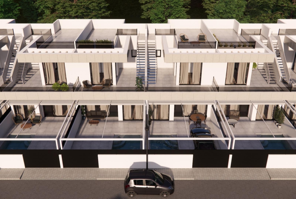Stunning modern 3-bedroom townhouse in Rojales with private pool, spacious terraces, and sleek basement parking.